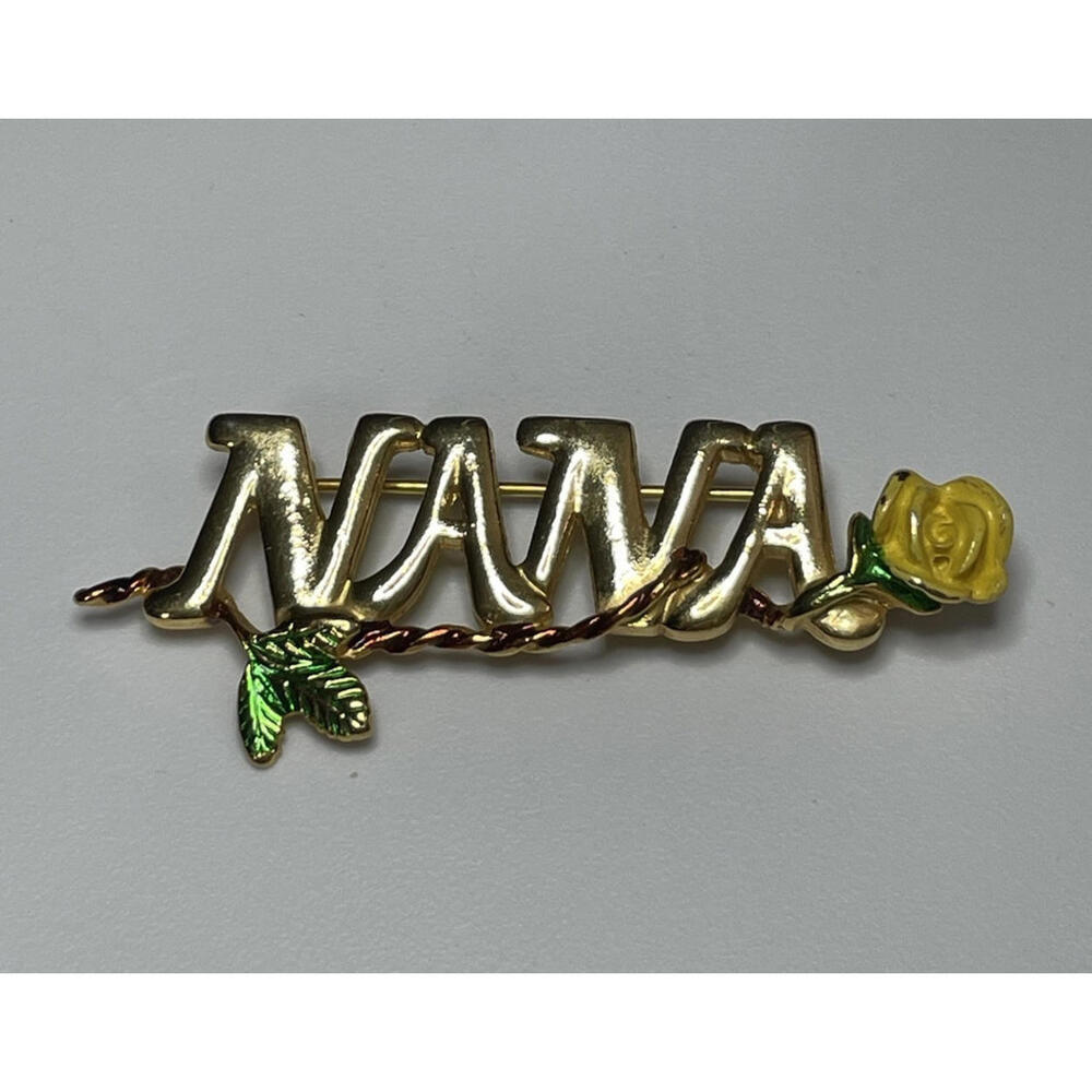 Vintage Dale Nana Brooch With Yellow Enamel Rose Gold Tone
